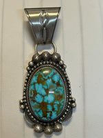 Navajo handcrafted sterling silver with genuine turquoise stone.  LZ309
