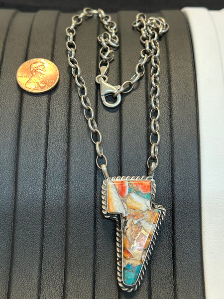 Navajo handcrafted sterling silver necklace with Turquoise and Spiney Oyster composite.