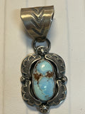 Navajo handcrafted sterling silver pendant by Greg Perry.  Golden Hills Turquoise stones.  LZ318