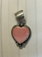 Navajo Handcrafted sterling silver pendant with natural pink Conch shell.  LZ336