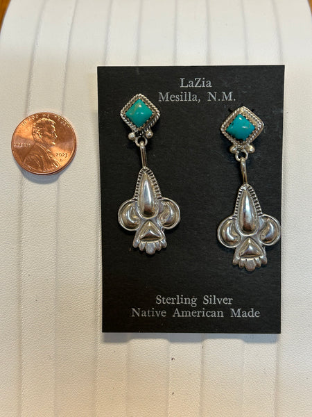 Navajo handcrafted sterling silver earrings with genuine turquoise stones.  LZ401