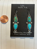 Navajo handcrafted sterling silver earrings with genuine turquoise stones.  LZ397
