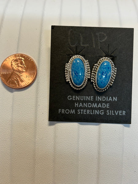 Navajo handcrafted sterling silver clip on earrings with Denim Lapis stone.  LZ382