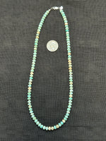 Genuine Turquoise beads with sterling silver beads and clasp necklace.  22” long.  SR1069