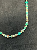 Genuine Sea Jasper necklace with 4mm and 6mm beads and sterling silver clasp.  20” long. SR1071
