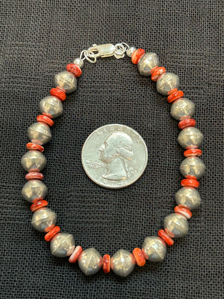 Genuine Spiney Oyster Shell and sterling silver bracelet in a 7.5” length.  SR1073 FREE SHIPPING IN THE CONTINENTAL USA.