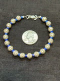 Genuine Lapis stone with sterling silver beads in a bracelet.  7.5” long.  SR1075 FREE SHIPPING IN THE CONTINENTAL USA.
