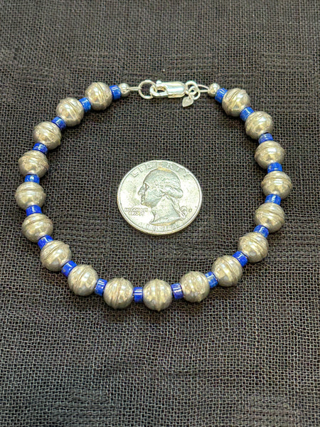 Genuine Lapis stone with sterling silver beads in a bracelet.  7.5” long.  SR1075 FREE SHIPPING IN THE CONTINENTAL USA.