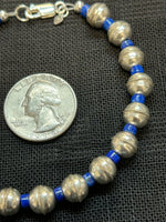 Genuine Lapis stone with sterling silver beads in a bracelet.  7.5” long.  SR1075 FREE SHIPPING IN THE CONTINENTAL USA.