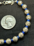 Genuine Lapis stone with sterling silver beads in a bracelet.  7.5” long.  SR1075 FREE SHIPPING IN THE CONTINENTAL USA.