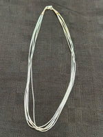 Sterling silver “liquid silver” necklace, 5 strand, 16” long.  SR1076