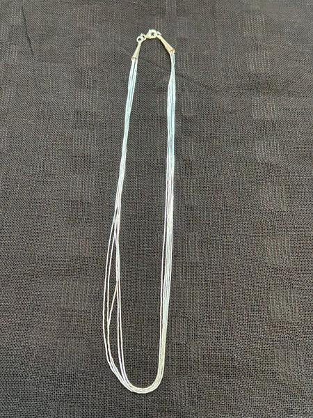 Sterling silver necklace called “liquid silver”, 18” long, 5 strand.  SR1077