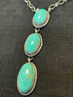Navajo handcrafted sterling silver necklace with genuine turquoise by Donovan Skeets.  LZ476