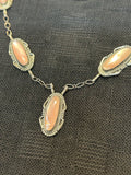 Navajo handcrafted sterling silver necklace with Pink Mother of Pearl.  LZ477