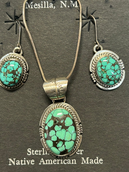 Navajo handcrafted sterling silver necklace and earrings set with genuine turquoise stones.  LZ478