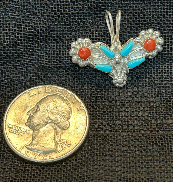 Zuni Handcrafted sterling silver pendant with genuine stones.  LZ518