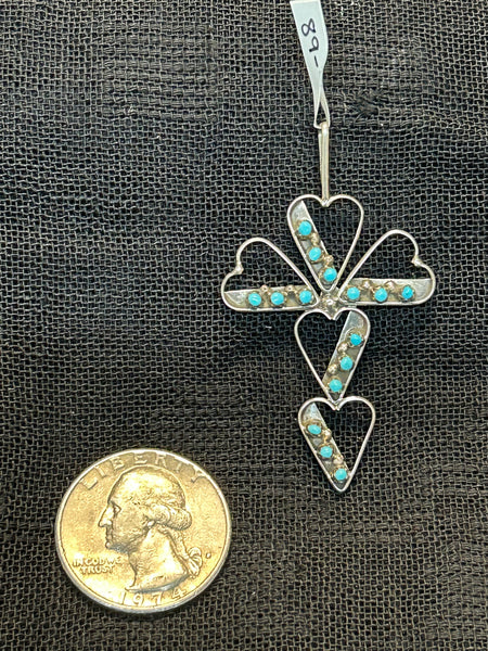 Zuni handcrafted sterling silver pendant with genuine turquoise.  LZ516