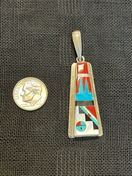 Zuni handcrafted sterling silver pendant with genuine stone inlay.  LZ530