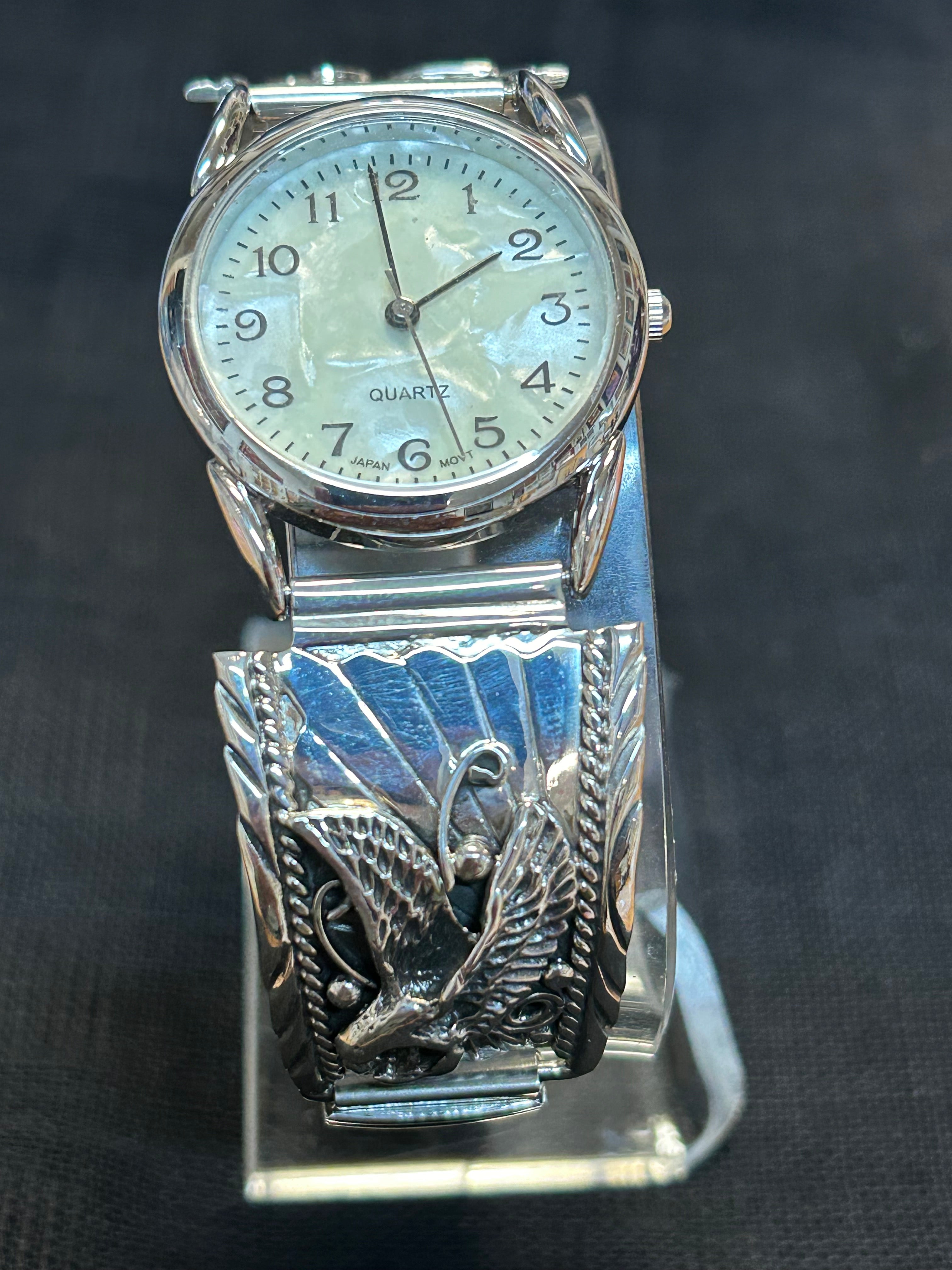 Navajo handcrafted sterling silver watch band with watch