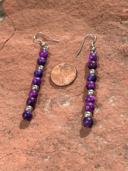 Genuine Sugulite earrings with hypoallergenic surgical steel ear wires.  SR1085 FREE SHIPPING IN THE CONTINENTAL USA.