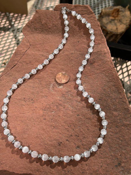 Genuine Selenite 6mm necklace, 24”, hypoallergenic surgical steel beads and clasp.
