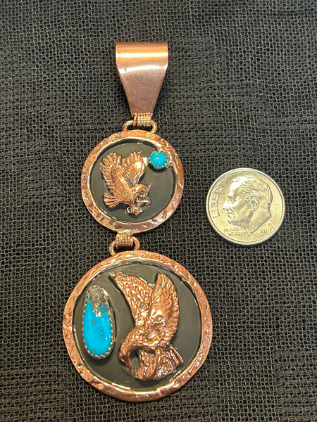 Navajo handcrafted solid copper with genuine turquoise pendant.  LZ557