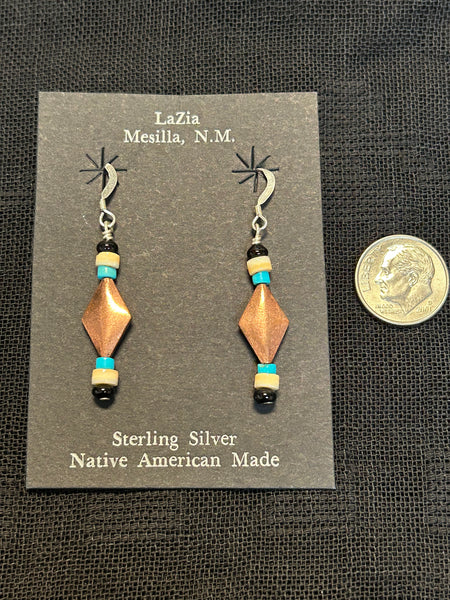 Navajo handcrafted sold copper earrings with sterling silver ear wires.  LZ565