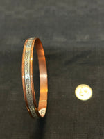 Navajo handcrafted solid copper bracelet. With sterling silver.  LZ583