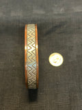 Navajo handcrafted solid copper with sterling silver accent.  LZ588