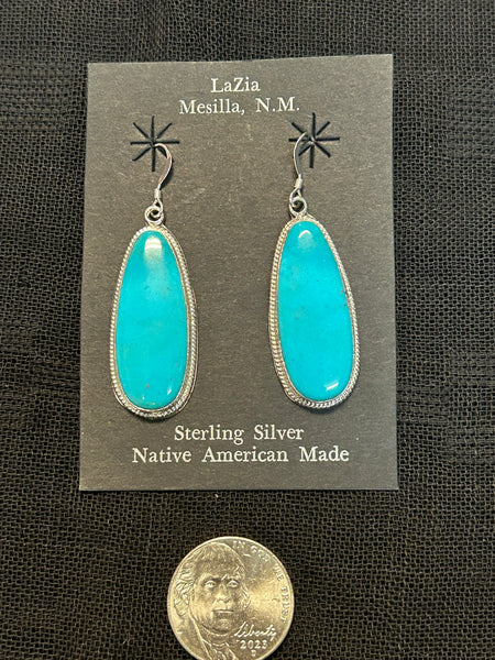 Navajo handcrafted sterling silver earrings with genuine turquoise stones.  LZ634