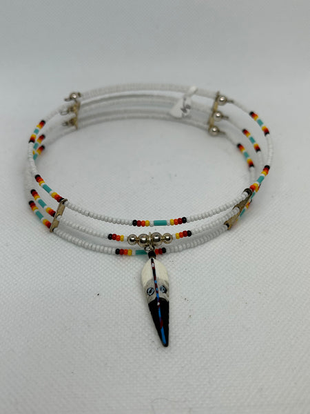 Navajo handcrafted triple strand glass bead necklace with carved feather.  LZ726