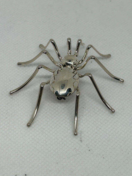 Navajo handcrafted Sterling Silver brooch in Soider motif.  LZ795