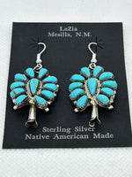 Navajo handcrafted sterling silver earrings with genuine turquoise stones.  LZ649
