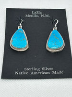 Navajo handcrafted sterling silver earrings with genuine turquoise stones.  LZ647