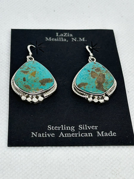 Navajo handcrafted sterling silver earrings with genuine turquoise stones.  LZ396