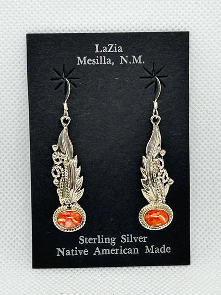 Navajo handcrafted sterling silver earrings with genuine Spiney Oyster shell stones.  LZ385