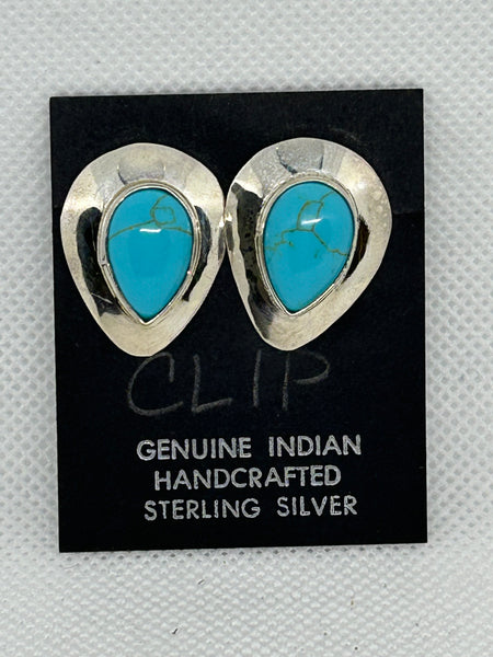 Navajo handcrafted sterling silver earrings with genuine turquoise stone.  LZ283