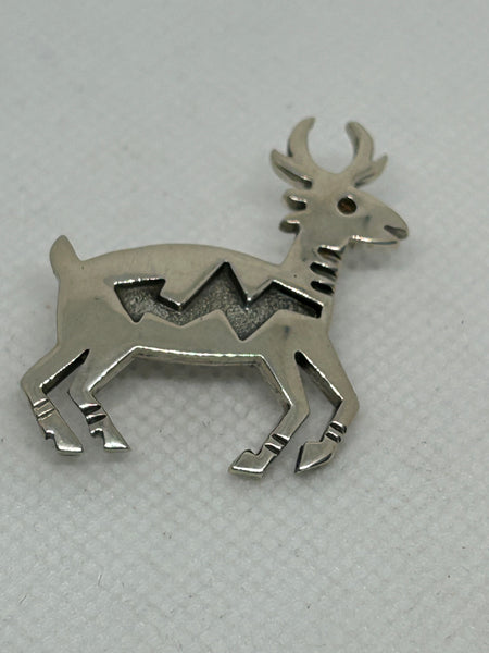 Navajo handcrafted sterling silver brooch .  LZ369