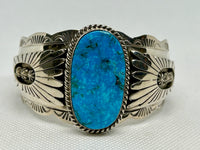 Navajo handcrafted sterling silver with genuine turquoise bracelet by James.  LZ797