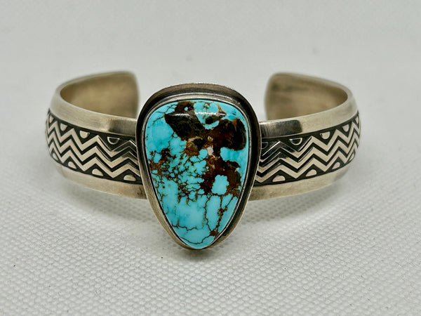 Navajo handcrafted sterling silver and genuine turquoise bracelet by B. Webb.  LZ798