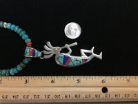 Navajo handcrafted sterling silver necklace with reversible Kokopelli pendant.  LZ294