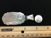 Navajo handcrafted sterling silver pendant with genuine turquoise stone.  LZ298