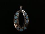 Navajo handcrafted sterling silver pendant with Lab Opal.  LZ295