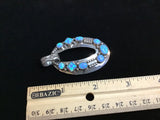 Navajo handcrafted sterling silver pendant with Lab Opal.  LZ295