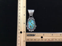 Navajo handcrafted sterling silver with genuine turquoise stone.  LZ309