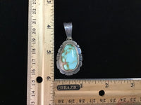 Navajo handcrafted sterling silver with genuine turquoise stone.  LZ299