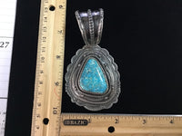 Navajo handcrafted sterling silver with genuine turquoise, by Hank Vanderer, 4.25” top to bottom, LZ116
