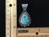 Navajo Handcrafted sterling silver and genuine turquoise pendant, 2” top to bottom, LZ098