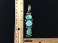 Navajo handcrafted sterling silver with genuine Royston Turquoise, 4” top to bottom, LZ109