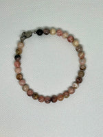 Genuine Rhodochrosite ankle bracelet with hypoallergenic stainless steel clasp.  9” long.  EP121 FREE SHIPPING IN THE CONTINENTAL USA.